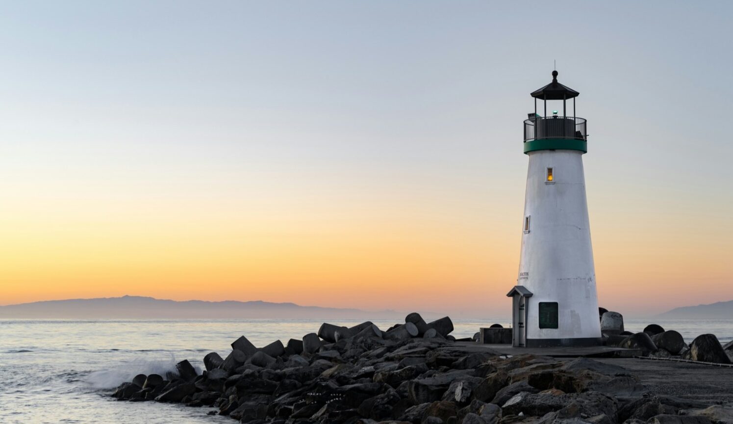 Lighthouse near water body